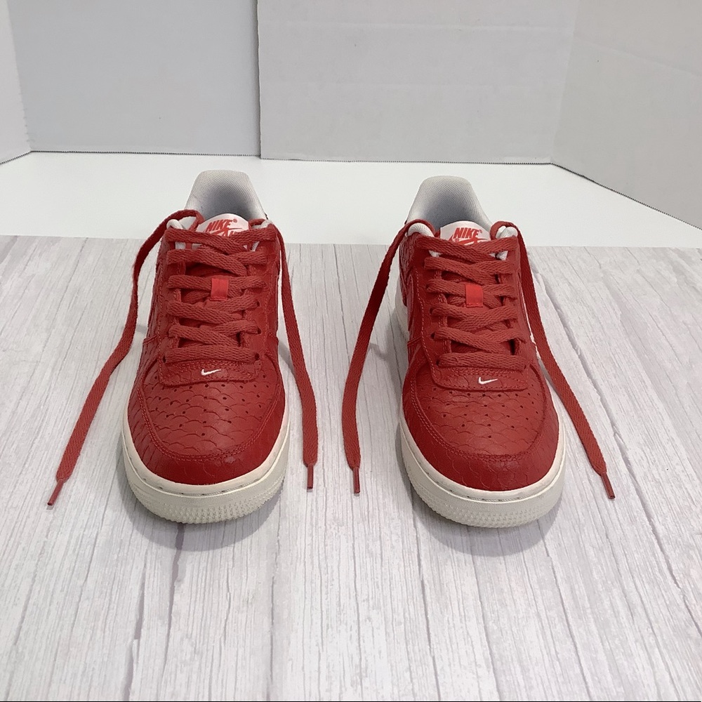 Red snakeskin print Nike air sneakers